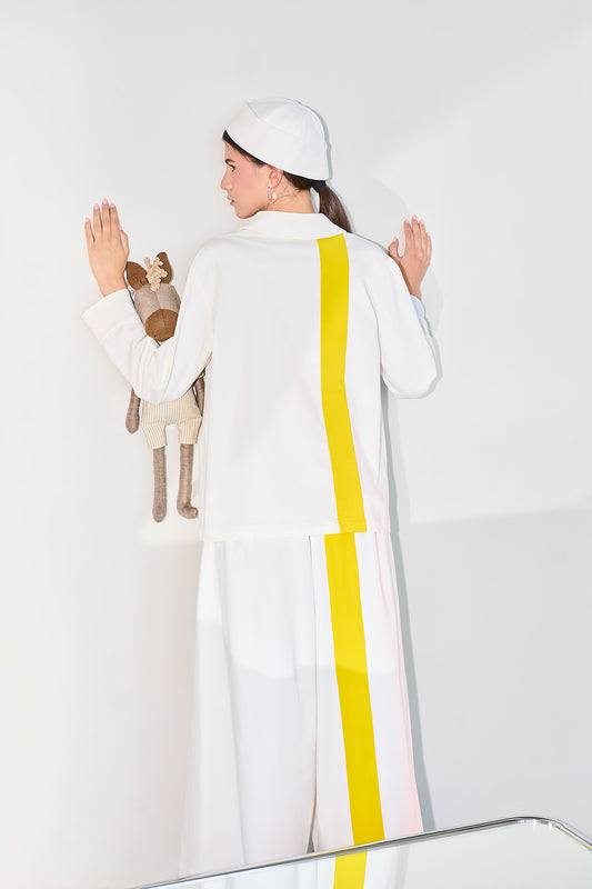 Pantaloni palazzo minimal con banda grafica a contrasto
